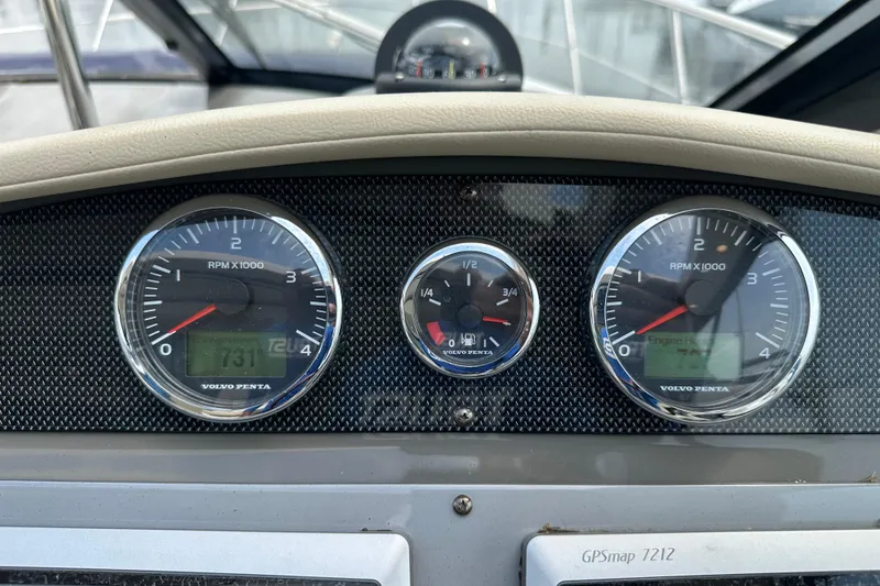 Slide: The Image of Dashboard of a 2012 Regal 42 Sport Coupe with Volvo Penta gauges. - 22