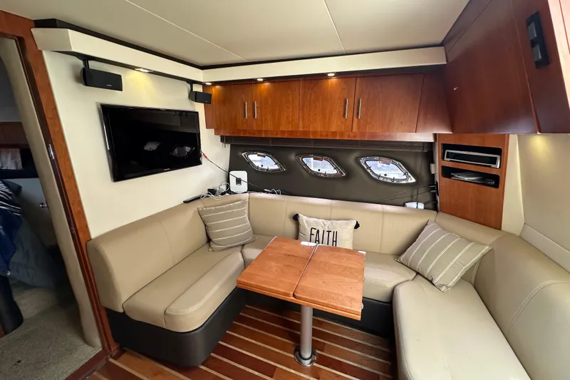 Slide: The Image of Luxurious interior of 2012 Regal 42 Sport Coupe with cozy seating and modern amenities. - 24