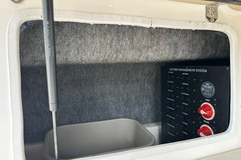 Slide: The Image of Battery management system in 2012 Regal 42 Sport Coupe boat compartment. - 41