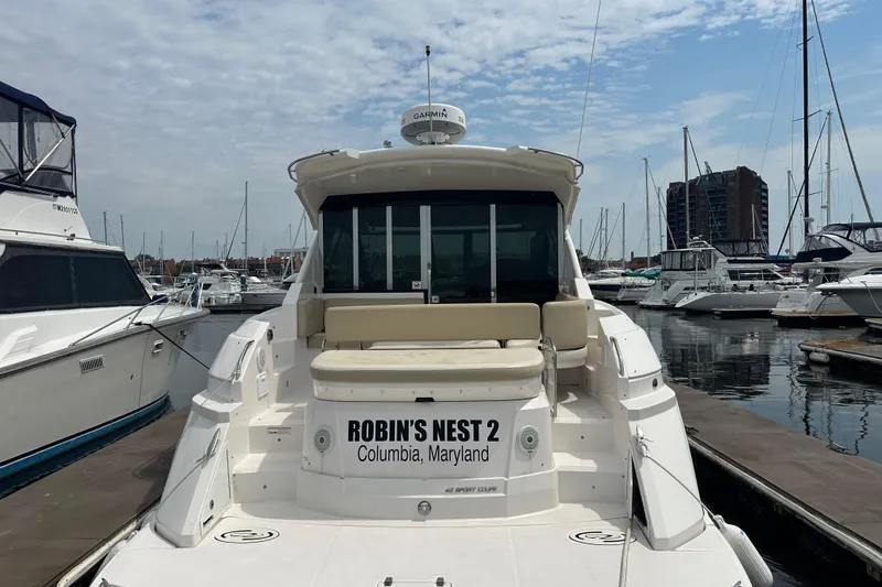 Slide: The Image of 2012 Regal 42 Sport Coupe yacht docked in Columbia, Maryland marina. - 5