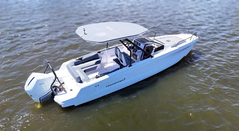Slide: The Image of A modern motorboat with a sunshade on calm water. - 9