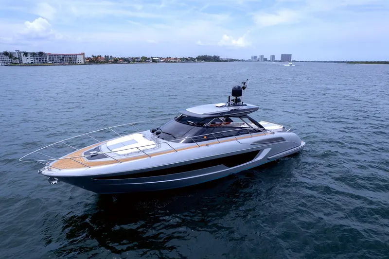 The Image of 2022 Riva 56' Rivale yacht cruising on open water under a clear sky. - 0