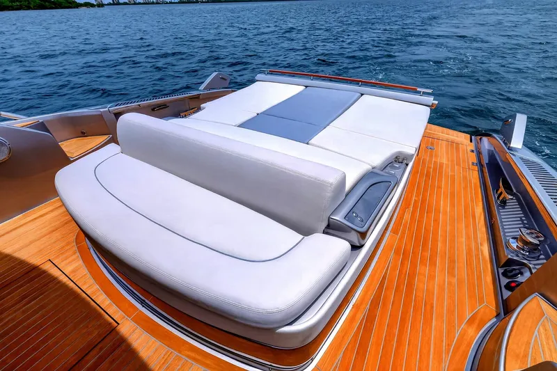 Slide: The Image of Luxurious 2022 Riva 56' Rivale yacht with elegant deck and comfortable seating. - 13