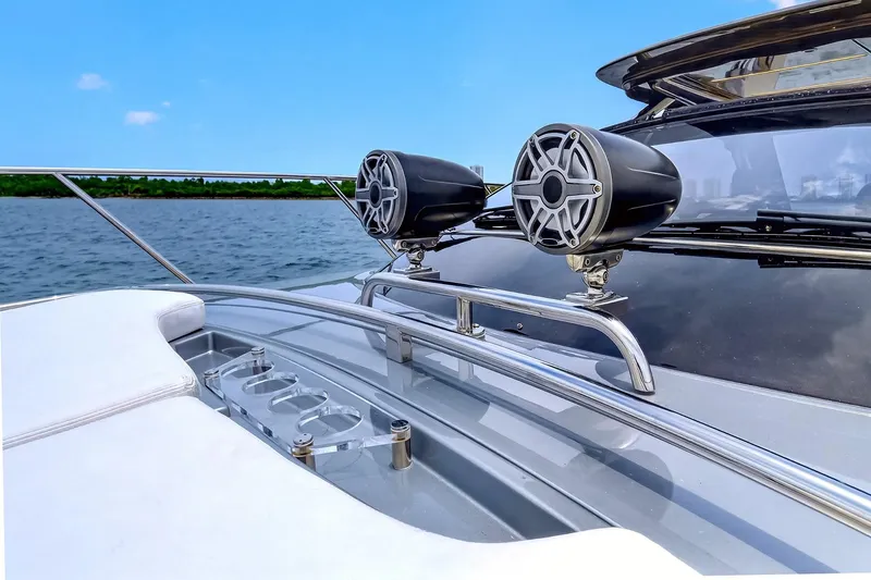 Slide: The Image of 2022 Riva 56' Rivale yacht deck with speakers and ocean view. - 17