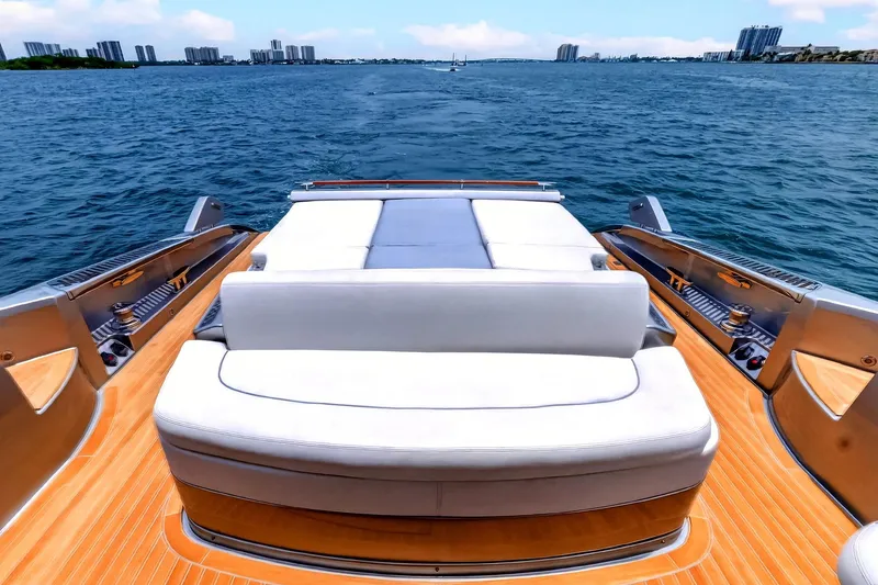 Slide: The Image of Luxurious 2022 Riva 56' Rivale yacht with elegant deck and scenic ocean view. - 23
