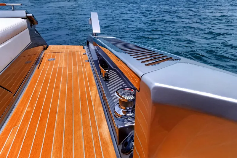 Slide: The Image of Luxury deck of 2022 Riva 56' Rivale yacht with sleek wood finish. - 27
