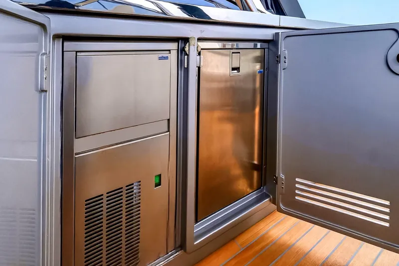 Slide: The Image of Stainless steel appliances on 2022 Riva 56' Rivale yacht, featuring sleek design and functionality. - 30