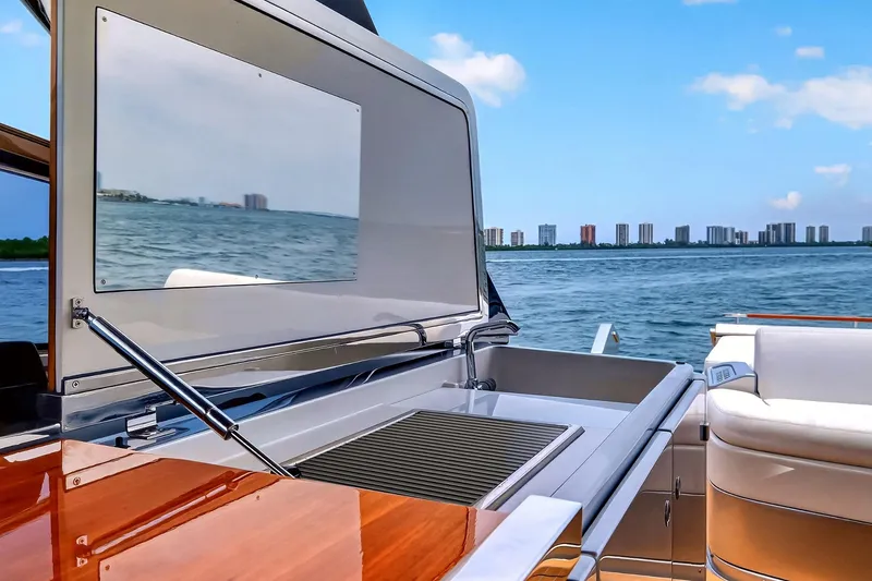 Slide: The Image of Luxury yacht Riva 56' Rivale 2022 with sleek outdoor kitchen, ocean view. - 31