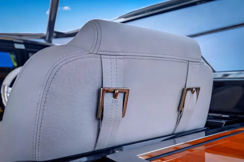 Slide: The Image of Luxurious interior of 2022 Riva 56' Rivale yacht, featuring elegant leather seating. - 32