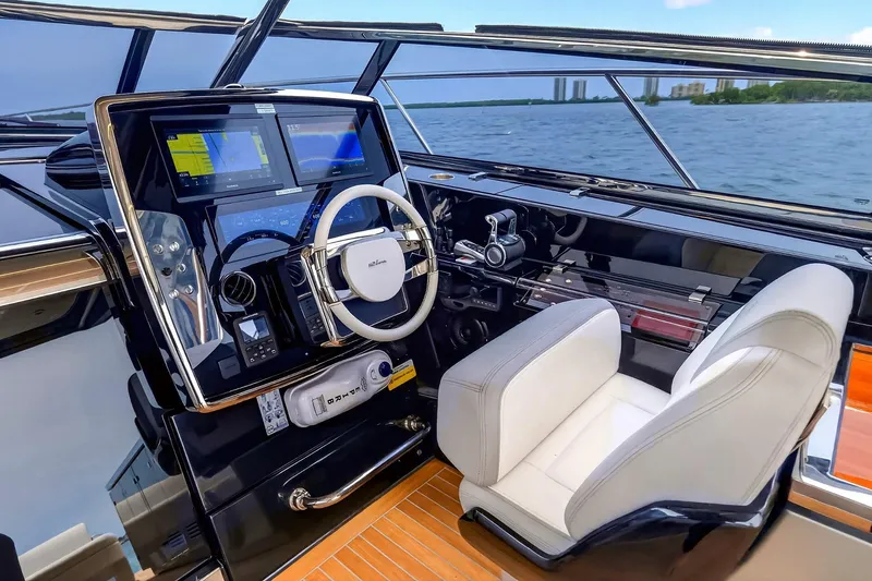 Slide: The Image of Luxurious helm of 2022 Riva 56' Rivale yacht with modern navigation systems. - 33