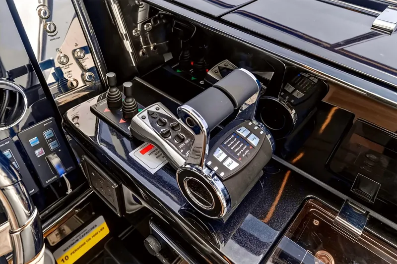 Slide: The Image of Control panel of 2022 Riva 56' Rivale yacht, featuring advanced navigation controls. - 35