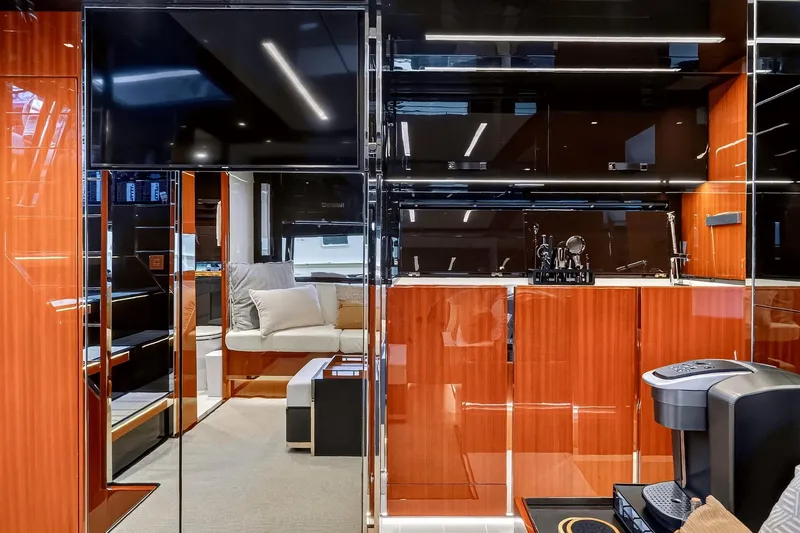 Slide: The Image of Luxurious interior of 2022 Riva 56' Rivale yacht with modern kitchen and seating area. - 50