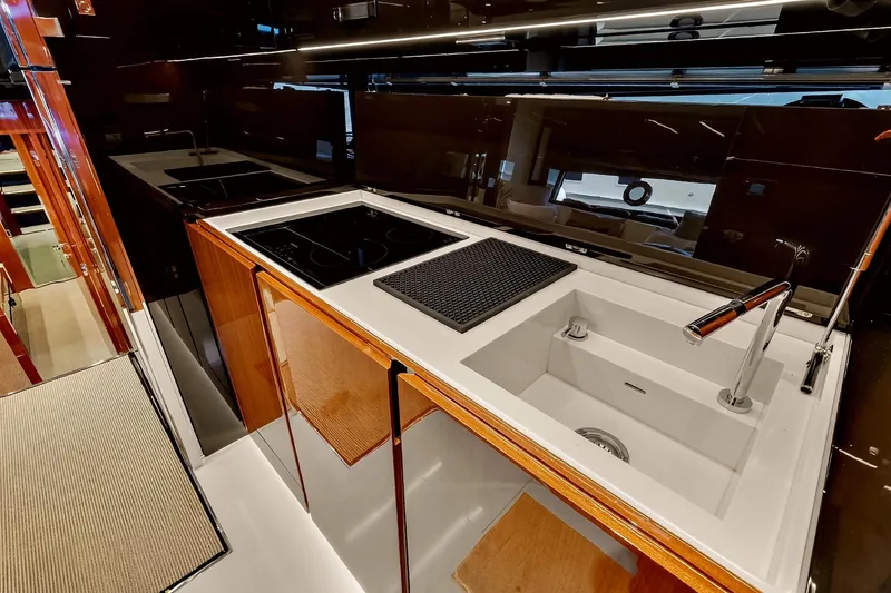 Slide: The Image of Luxurious kitchen interior of 2022 Riva 56' Rivale yacht with modern appliances and sleek design. - 53