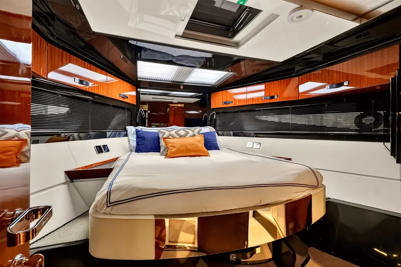 Slide: The Image of Luxurious interior of 2022 Riva 56' Rivale yacht with elegant bedding and modern design. - 55