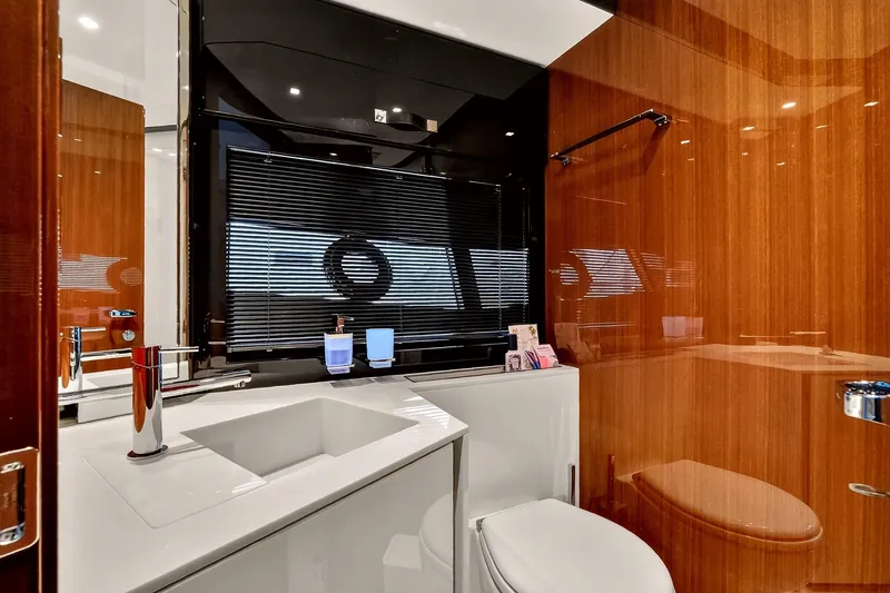 Slide: The Image of Luxurious bathroom interior of 2022 Riva 56' Rivale yacht with sleek wood finishes. - 59