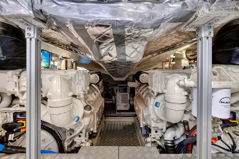 Slide: The Image of Engine room of 2022 Riva 56' Rivale yacht, showcasing dual MAN engines. - 65