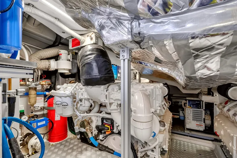 Slide: The Image of Engine room of 2022 Riva 56' Rivale yacht, showcasing advanced machinery and equipment. - 66