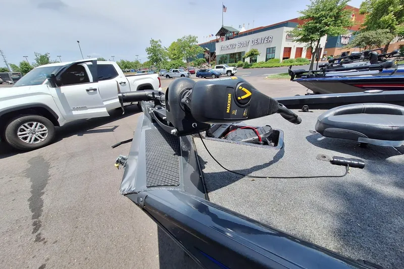 Slide: The Image of 2021 Boomeranger RT188P boat with trolling motor at Tracker Boat Center parking lot. - 3