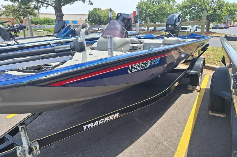 Slide: The Image of 2016 Tracker Pro Team 175 TF boat on trailer in parking lot. - 1