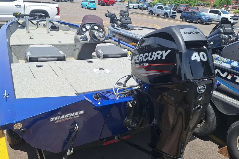 Slide: The Image of 2016 Tracker Pro Team 175 TF boat with Mercury 40 engine in parking lot. - 6