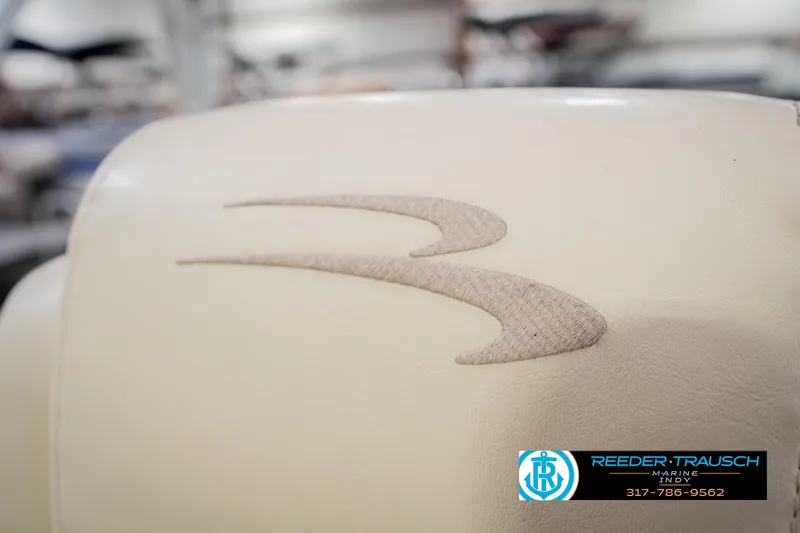 Slide: The Image of Close-up of 2013 Bennington 2550 RBR boat seat with logo embroidery. - 49