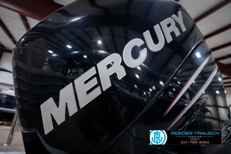 Slide: The Image of Mercury outboard engine on a 2013 Bennington 2550 RBR boat in a showroom. - 62