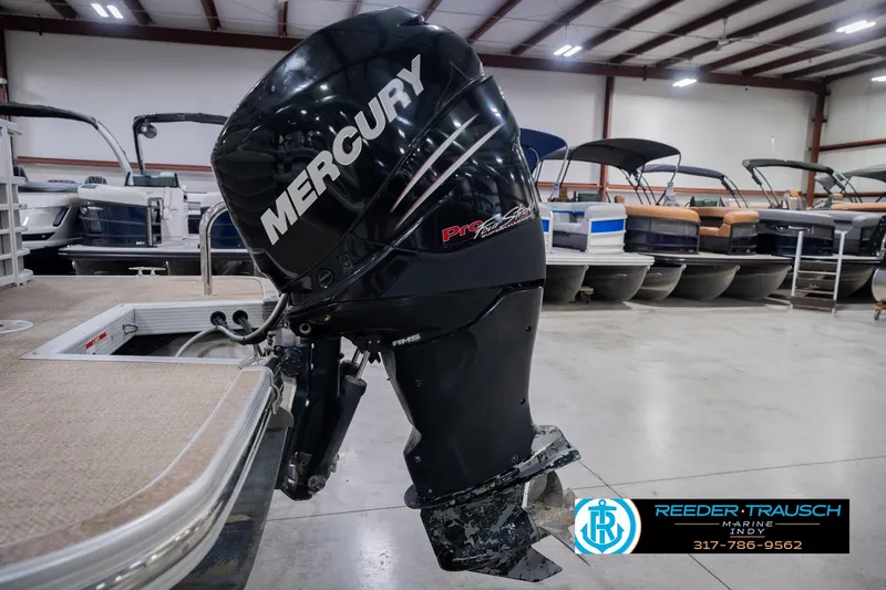 Slide: The Image of 2013 Bennington 2550 RBR with Mercury Pro XS outboard motor in showroom. - 61