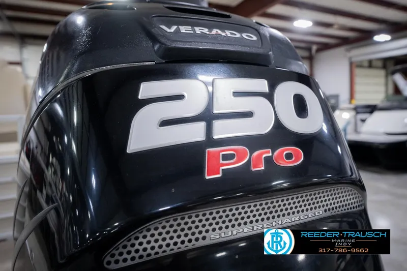 Slide: The Image of Close-up of a 2013 Bennington 2550 RBR boat's Verado 250 Pro engine. - 63