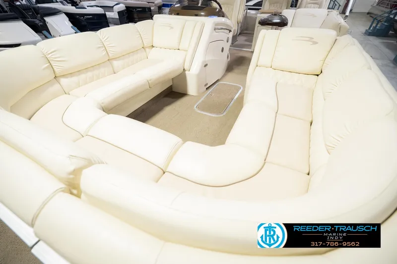 Slide: The Image of Luxurious interior of 2013 Bennington 2550 RBR pontoon boat with plush seating. - 13