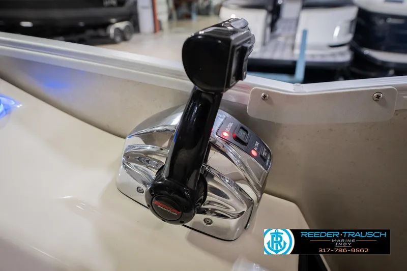 Slide: The Image of Throttle control of a 2013 Bennington 2550 RBR boat, featuring chrome finish. - 47
