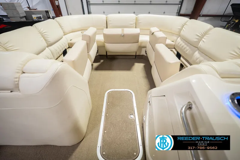 Slide: The Image of Luxurious interior of a 2013 Bennington 2550 RBR pontoon boat with plush seating. - 26