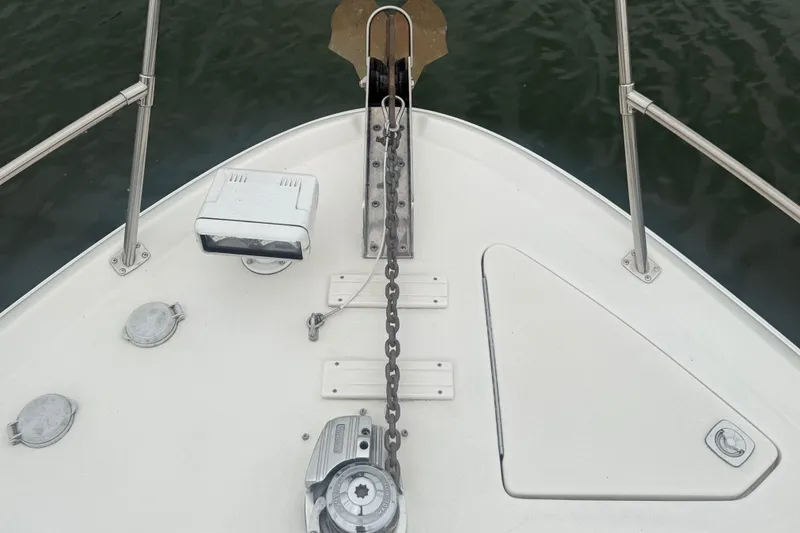 Slide: The Image of Bow of 1998 Sea Ray Sundancer 400 with anchor chain and marine equipment. - 2