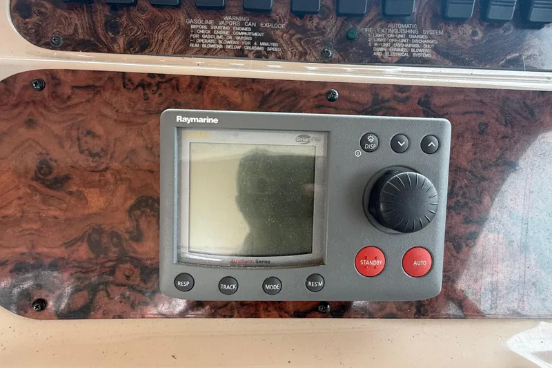 Slide: The Image of Raymarine autopilot control on 1998 Sea Ray Sundancer 400 dashboard. - 20