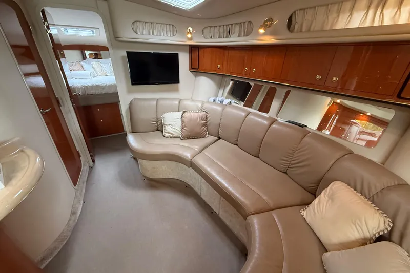 Slide: The Image of Luxurious interior of 1998 Sea Ray Sundancer 400 yacht with plush seating and modern amenities. - 24