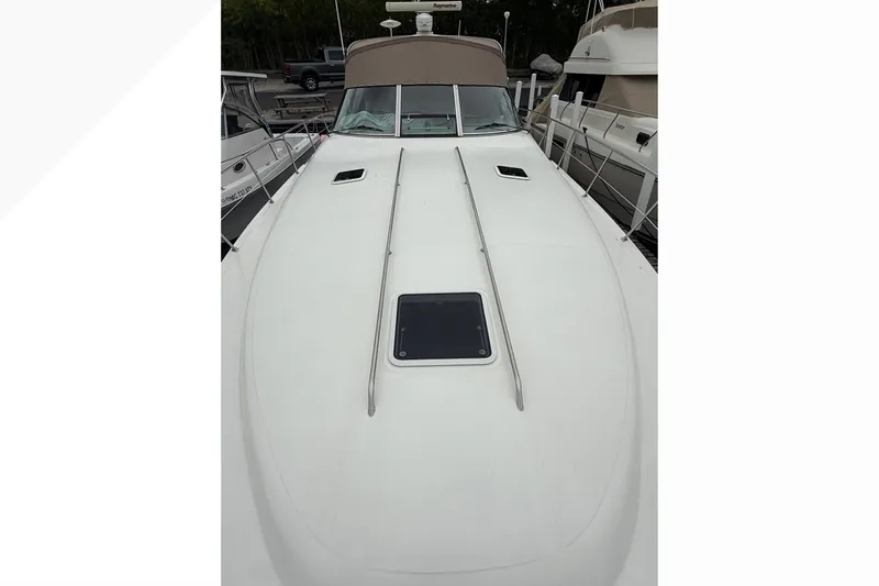 Slide: The Image of 1998 Sea Ray Sundancer 400 yacht deck view at marina. - 3