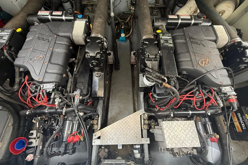 Slide: The Image of Engine room of a 1998 Sea Ray Sundancer 400 with dual V8 engines. - 39