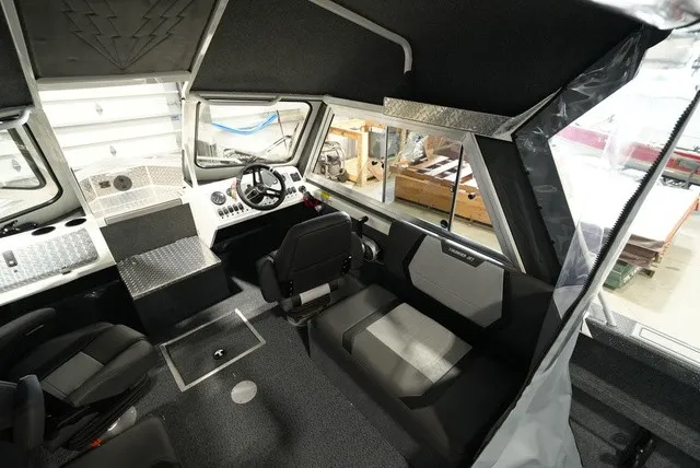 Slide: The Image of Interior of the 2027 Thunder Jet 210 Luxor Limited with modern seating and control console. - 17