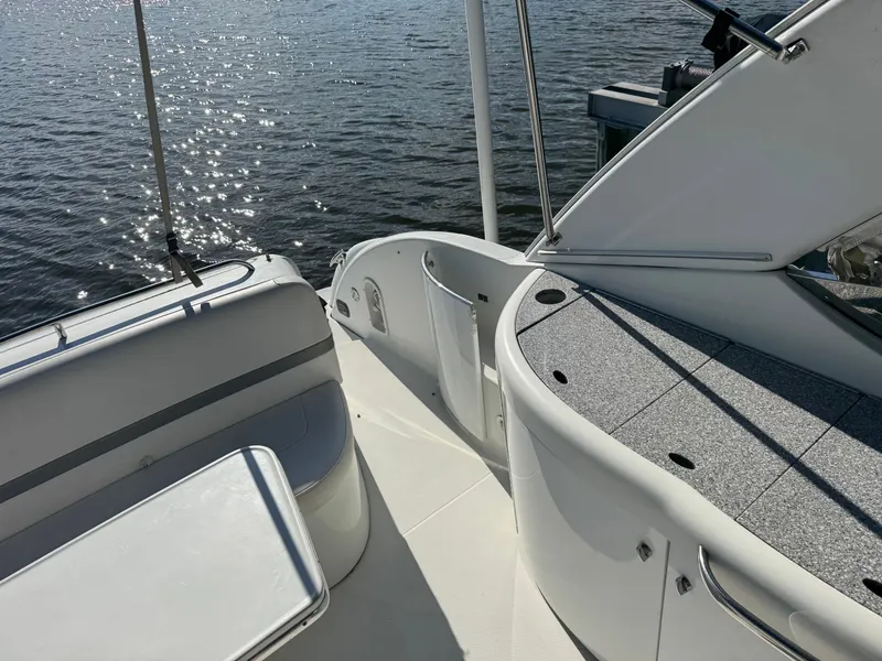 Slide: The Image of The boat features a modern deck design with gray and white surfaces. - 21