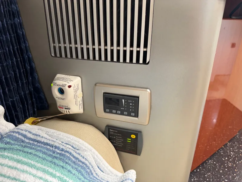 Slide: The Image of Interior of a boat with a vent and control panel. - 36