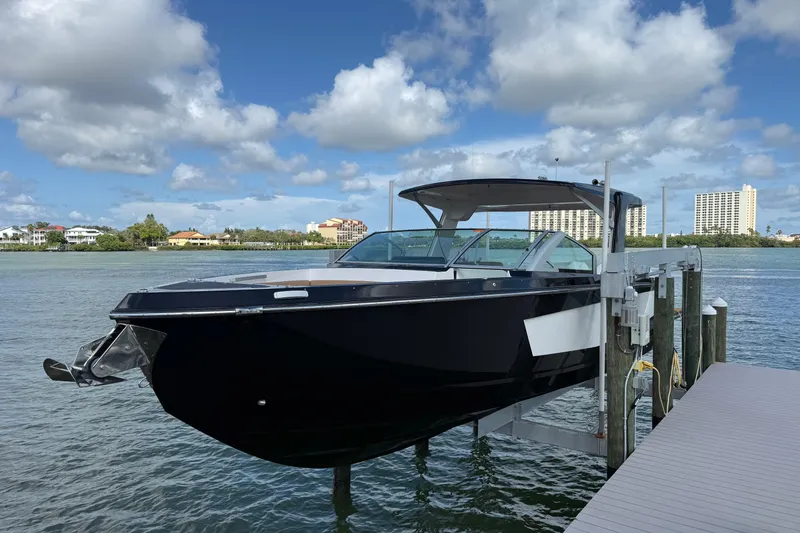 The Image of 2023 Aviara AV36 OB boat docked on a sunny waterfront. - 0