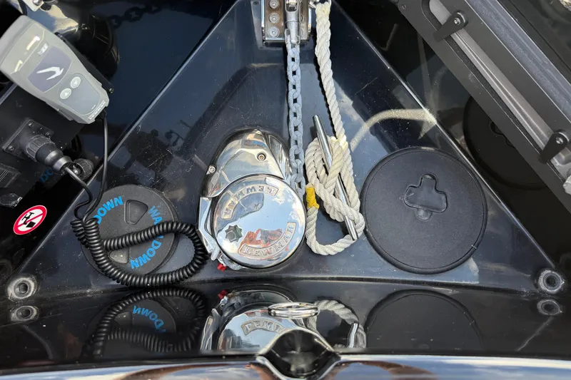 Slide: The Image of 2023 Aviara AV36 OB boat anchor system with ropes and controls. - 16