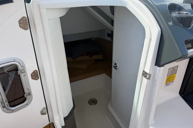 Slide: The Image of 2023 Aviara AV36 OB cabin entrance with open door, showcasing interior space. - 29