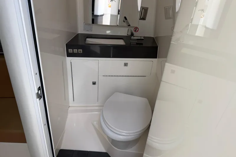 Slide: The Image of 2023 Aviara AV36 OB boat bathroom with modern sink and toilet. - 34