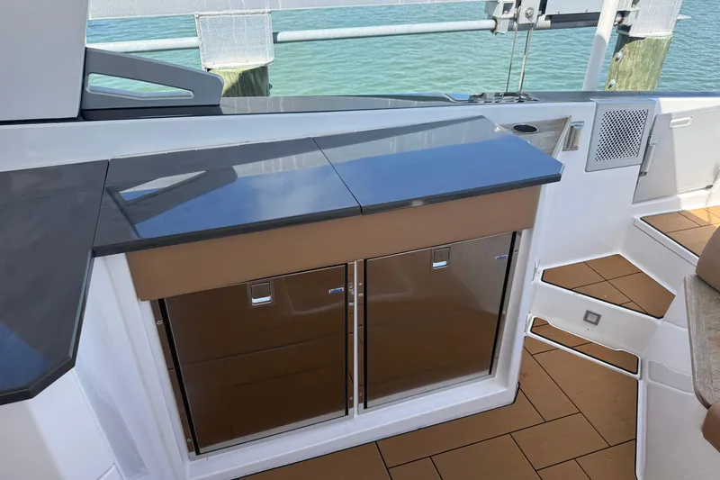 Slide: The Image of 2023 Aviara AV36 OB boat interior with sleek cabinetry and modern design. - 36