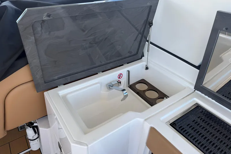 Slide: The Image of 2023 Aviara AV36 OB boat sink with faucet and cup holders. - 37