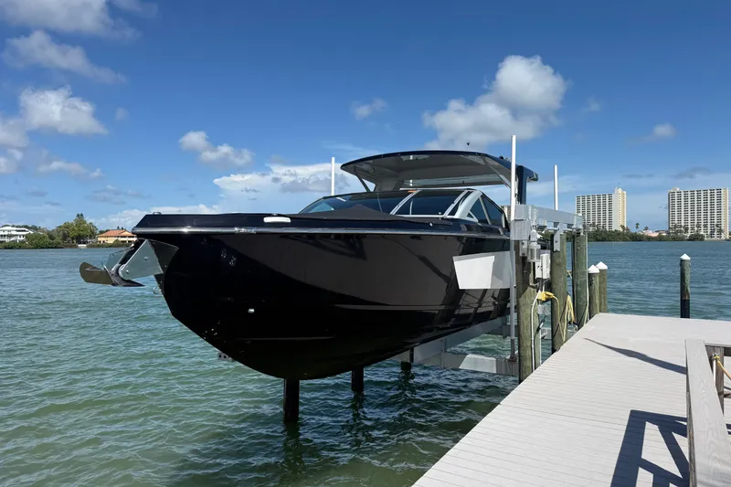Slide: The Image of 2023 Aviara AV36 OB boat docked on a sunny day with clear skies. - 4