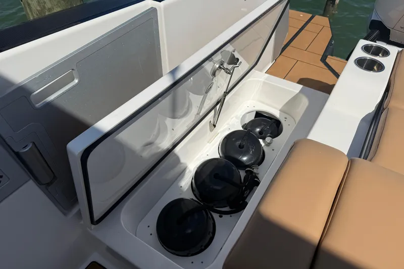 Slide: The Image of 2023 Aviara AV36 OB boat storage compartment with fenders and seating area. - 52