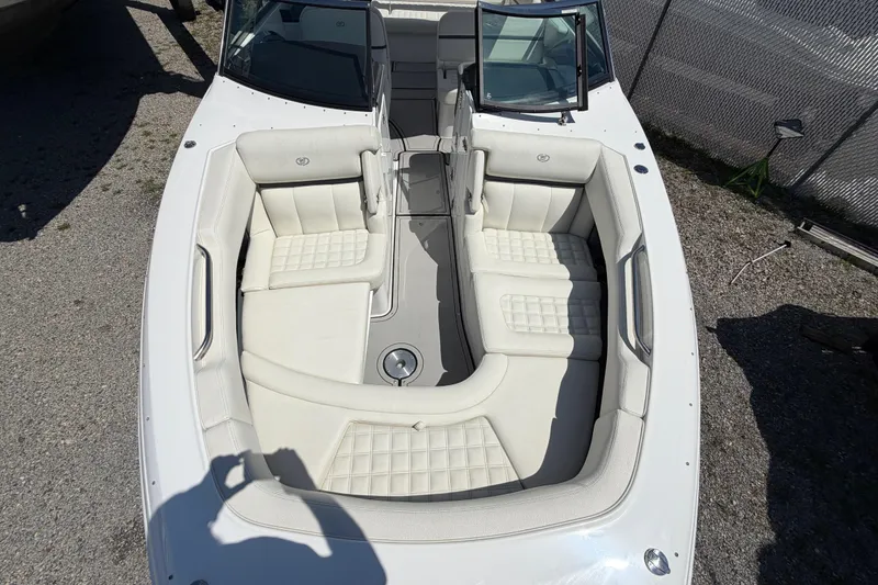 Slide: The Image of 2021 Cobalt 30SC boat with luxurious white seating and open deck design. - 37