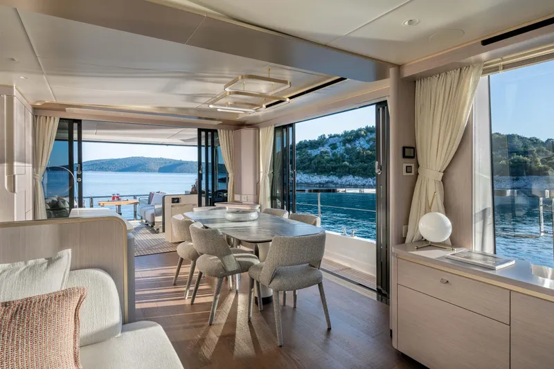 Slide: The Image of Luxurious interior of 2027 Absolute 70 Fly yacht with scenic ocean view. - 32