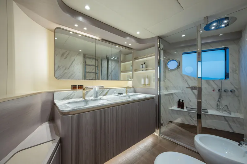 Slide: The Image of Luxurious bathroom on 2027 Absolute 70 Fly yacht with modern fixtures and elegant design. - 39